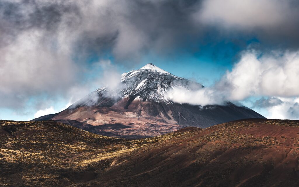 Mountain Teide in Tenerife filled with snow and clouds