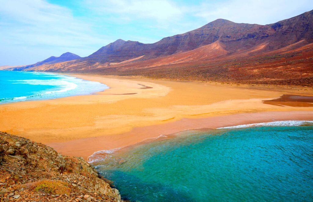 Sun-kissed beach with turquoise waters in Fuerteventura, Canary Islands