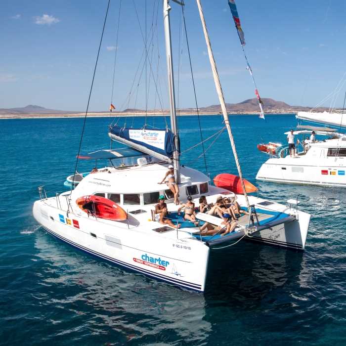 Passengers enjoying a catamaran cruise off the coast of Fuerteventura.