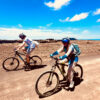 two travellers biking in Corralejo