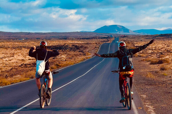 two friends on a bike in fuerteventura